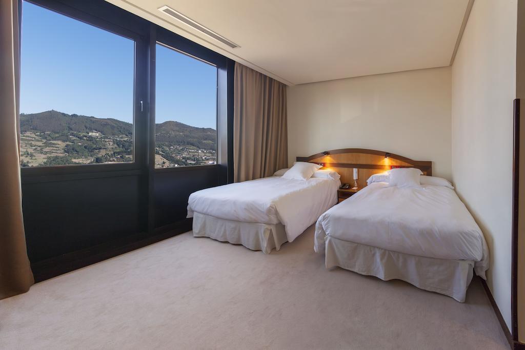 اوفيدو New Hotel الغرفة الصورة